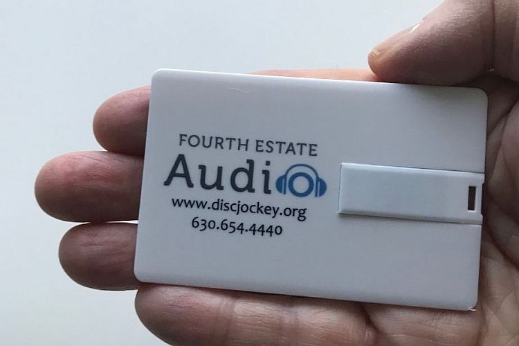 A hand hoding the Fourth Estate audio FlashCard