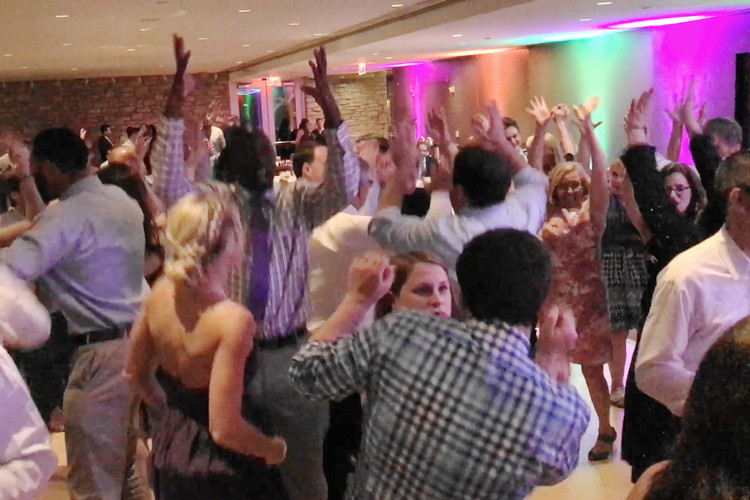 Wedding attendees on dance floor