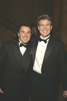 Christopher Knight and Jay Congdon wearing black suits